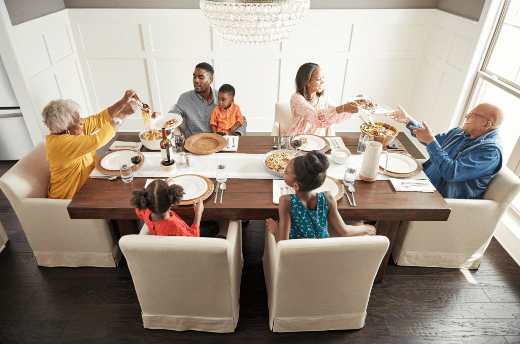 Family having breakfast at the dining table | Speers Road Broadloom